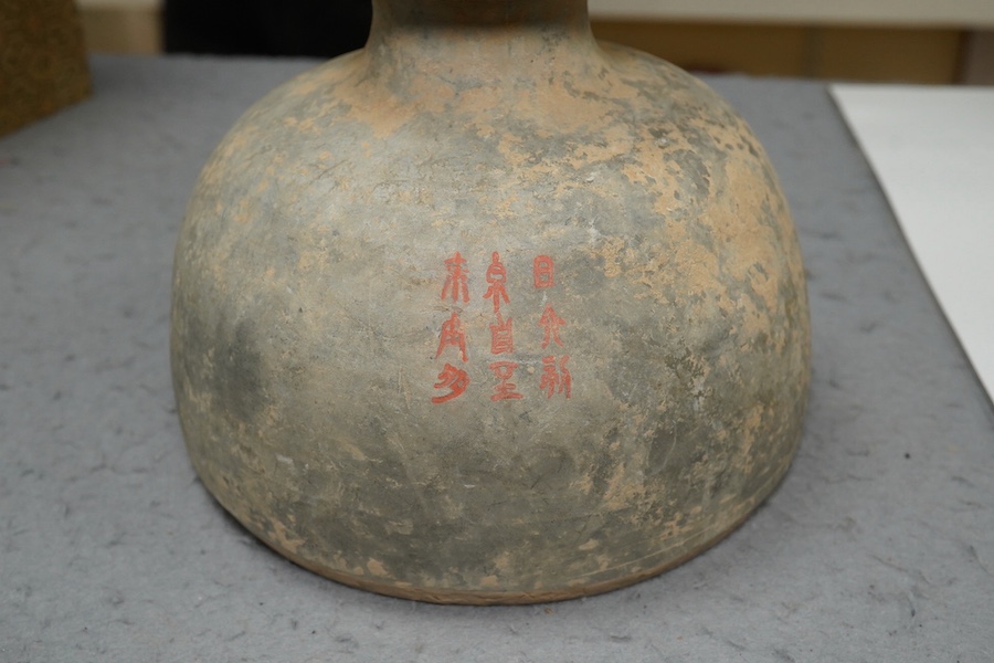 Four very rare Chinese inscribed pottery jars, Han dynasty